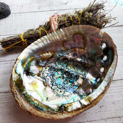 a bowl with a small piece of glass inside