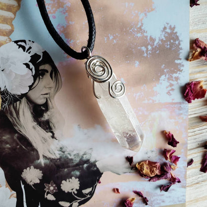 a necklace with a photo of a woman on it