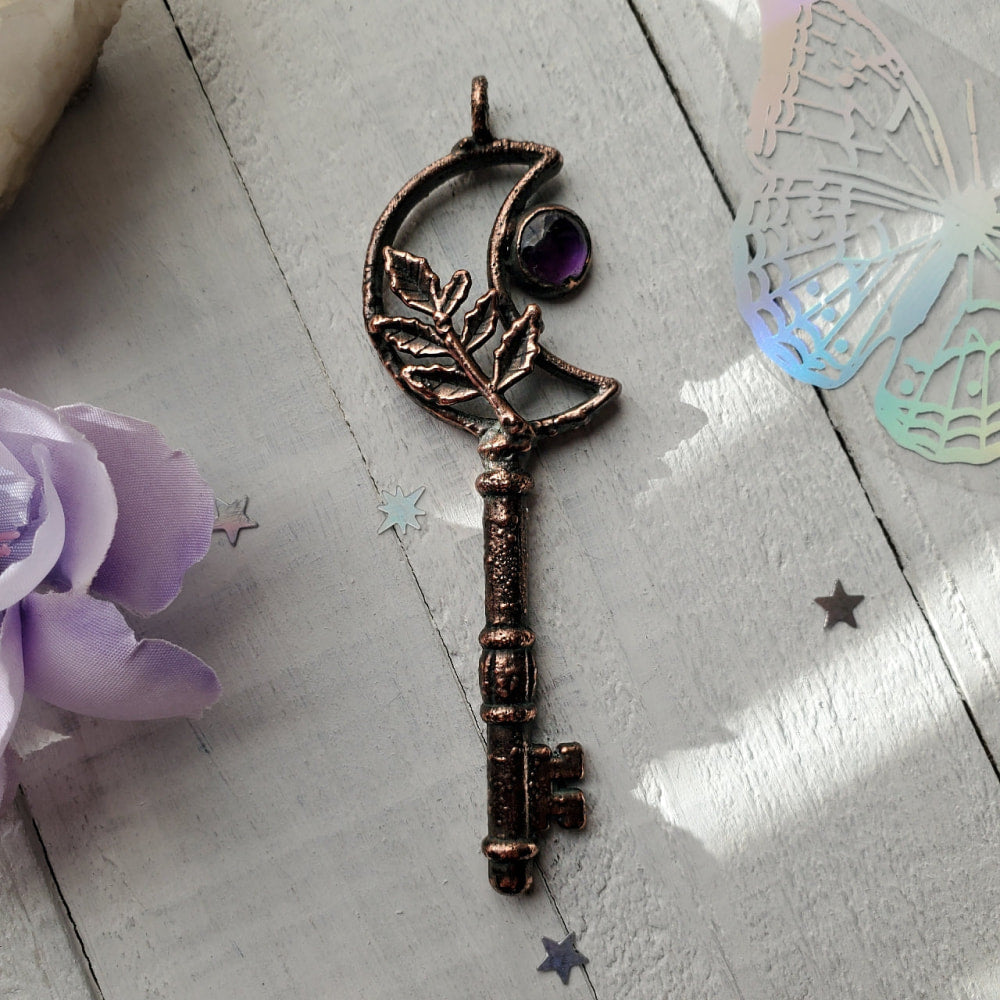 a key with a rose on it