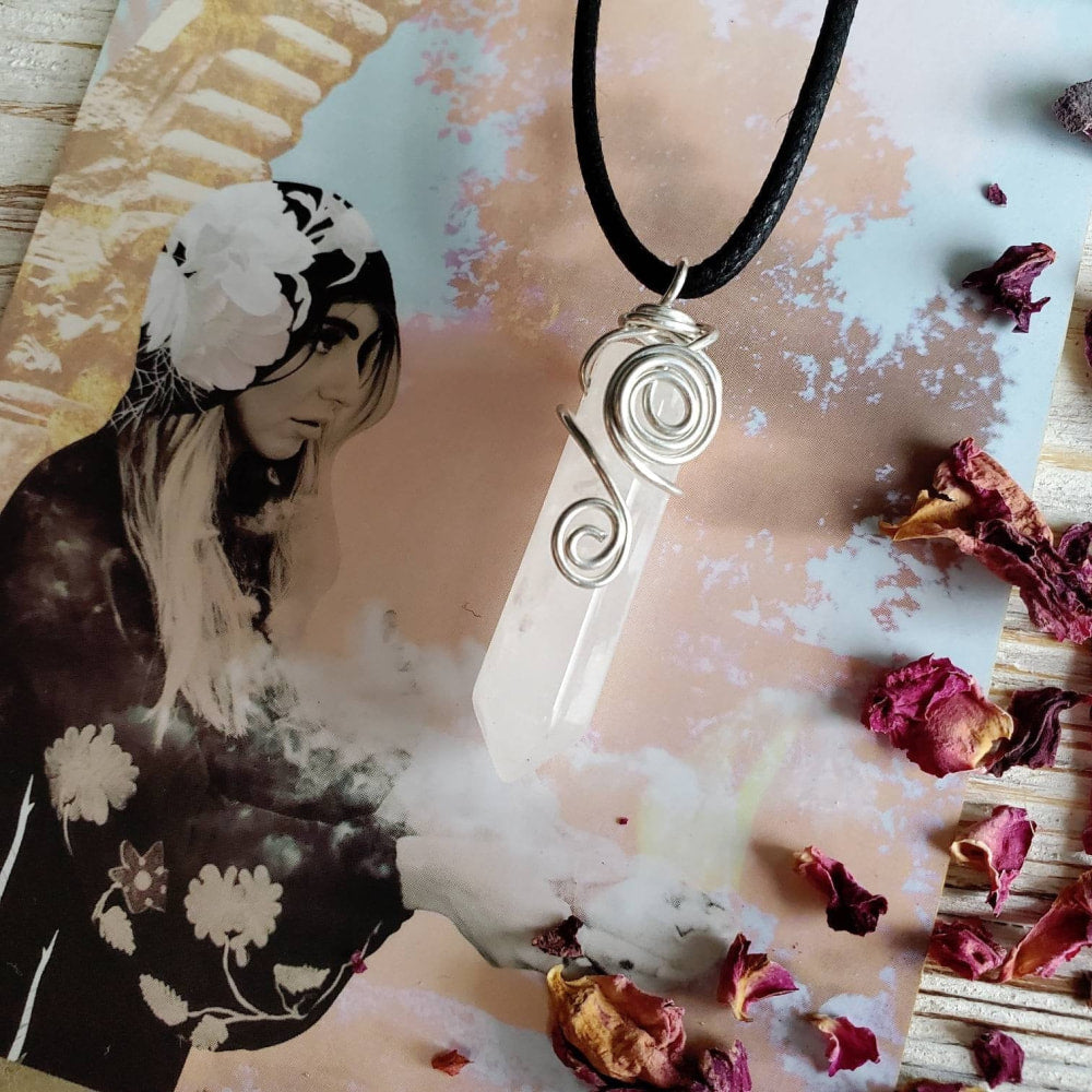 a necklace with a picture of a woman on it