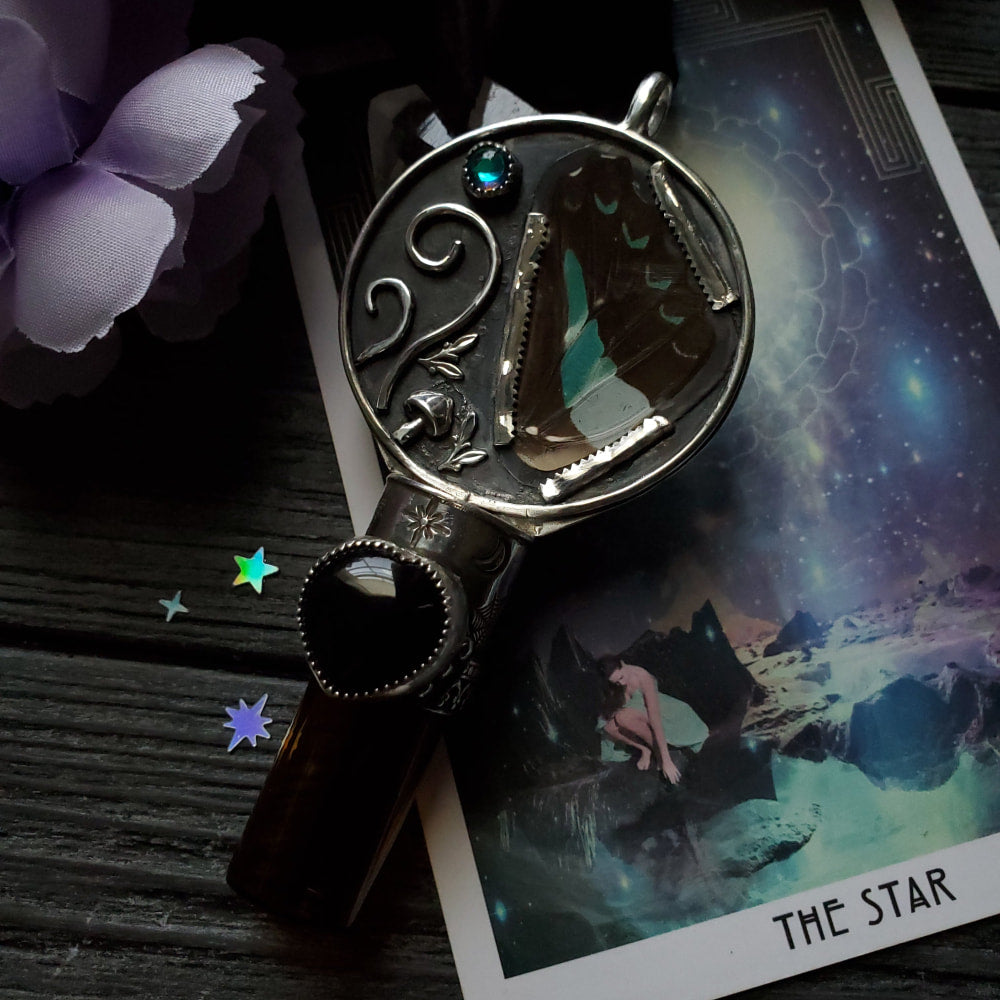 a keychain with a picture of a woman and a star