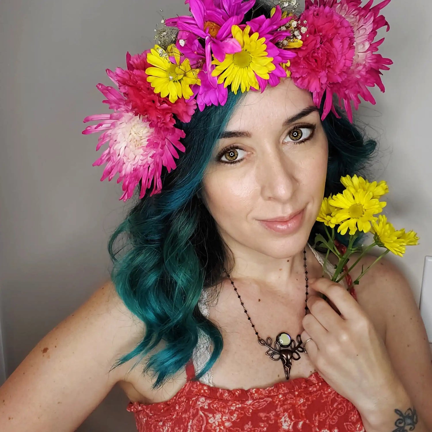 Woman wearing a floral crown.